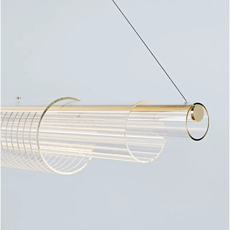 Modern minimalist glass pendant lamp with iron fittings in three size options.