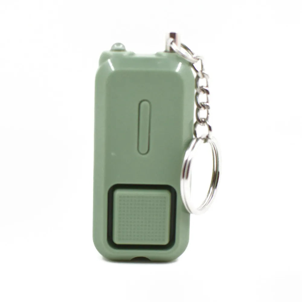 Compact personal safety alarm device in multiple colours showing 65x30x12mm dimensions