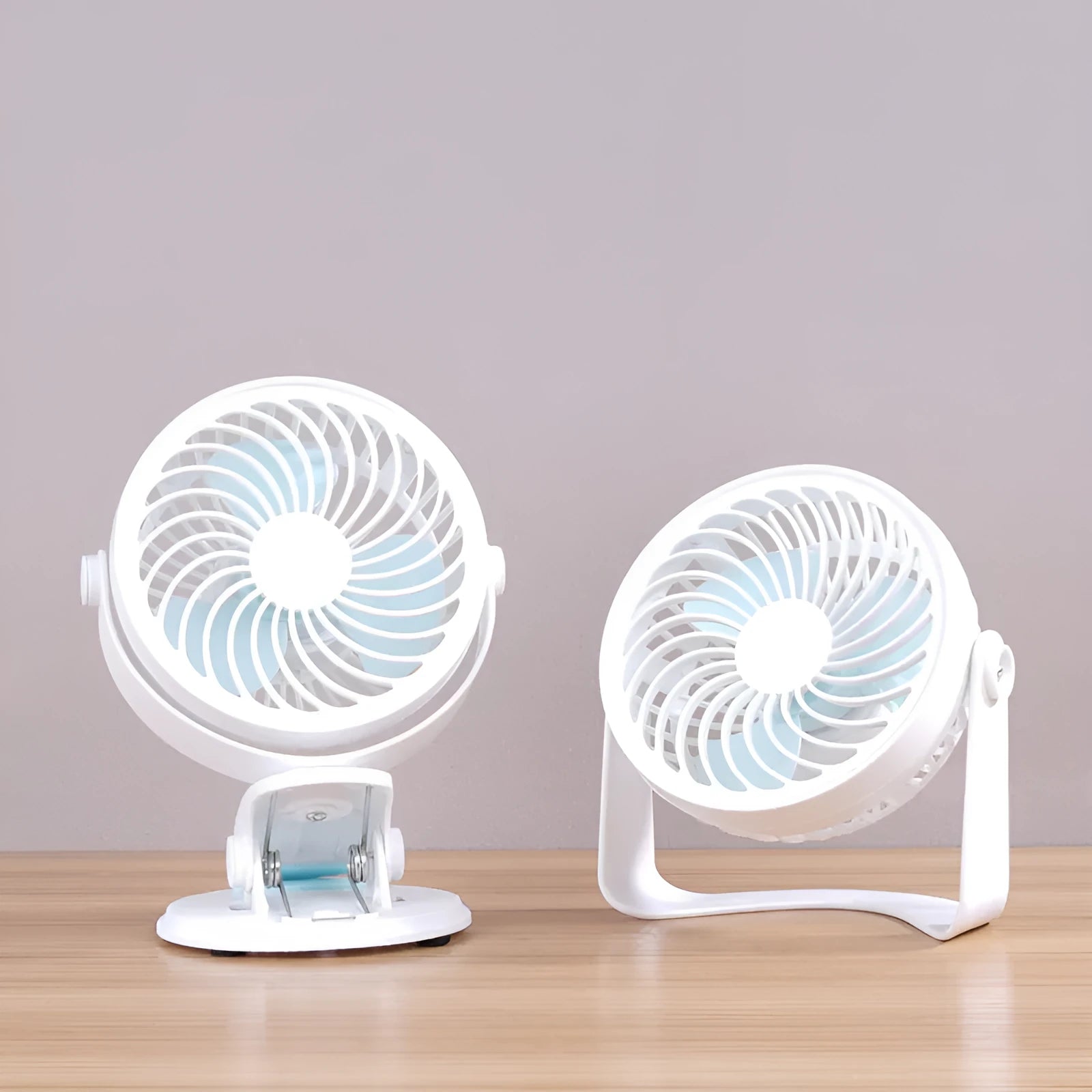 USB-powered desk fan with clip and floor positioning options, showing compact 19cm design