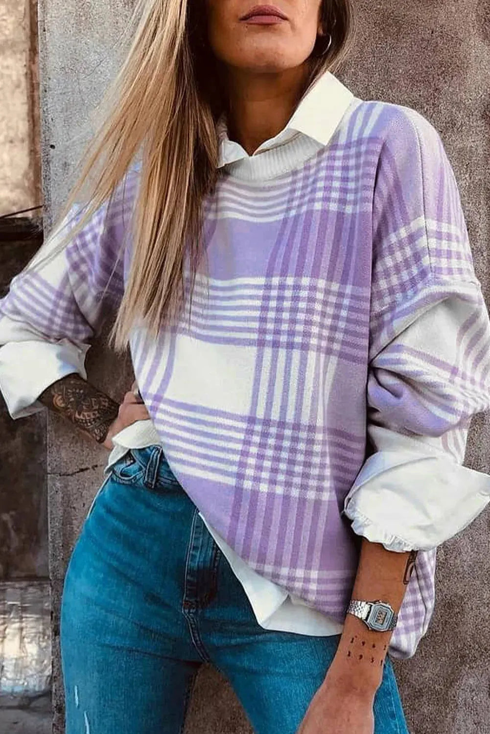 Loose lilac plaid print sweater with ribbed trim on cuffs and hem, long sleeves.