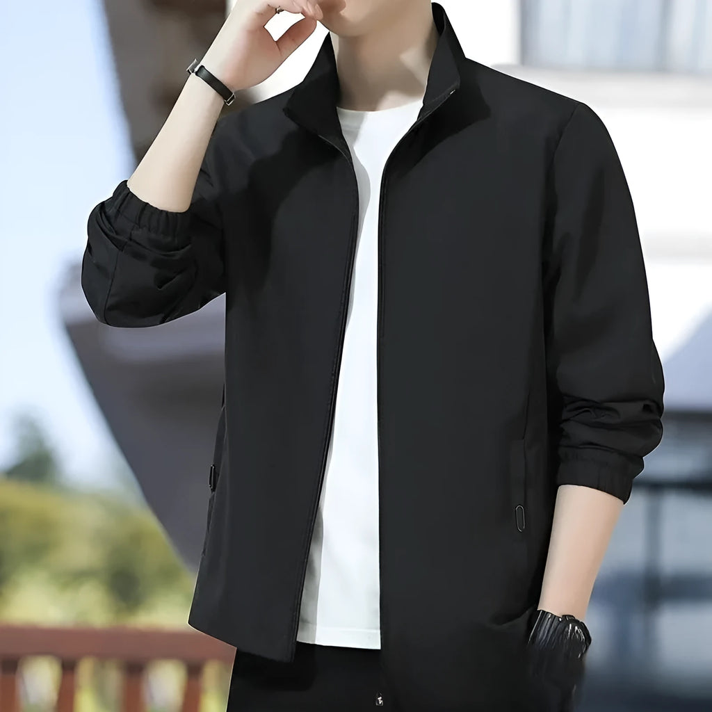 Men's loose fit Korean style lapel jacket in black casual autumn outerwear with zipper pocket