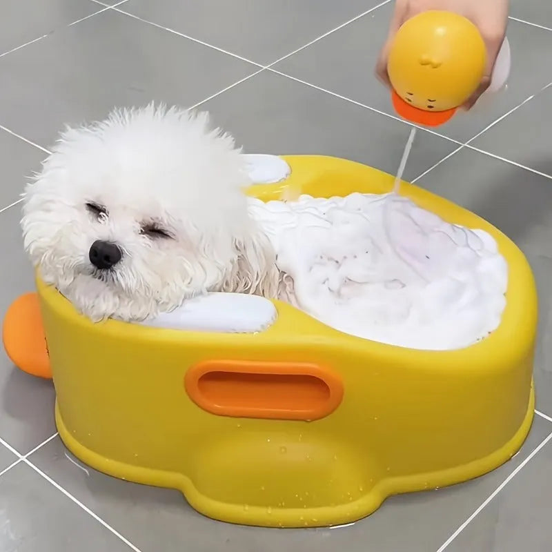 Blue PVC duck-shaped bathtub for dogs and cats on a white background
