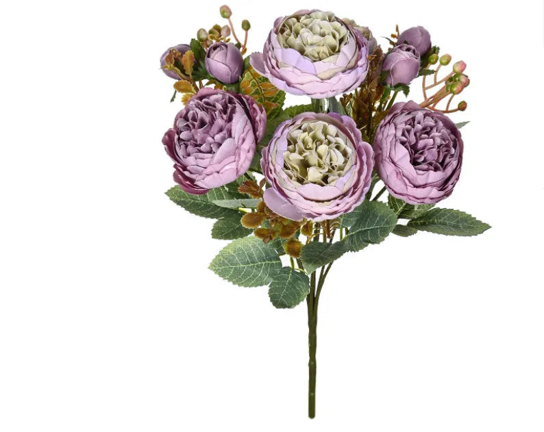 Silk artificial peony bouquet arrangement in champagne colour for home or wedding decor.