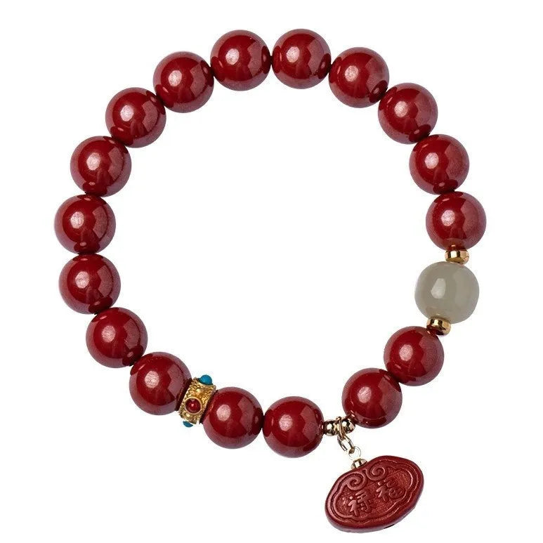 Natural cinnabar bracelet with emperor sandstone Ping An Fu Lu design in 8mm and 10mm sizes