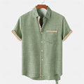 Loose fit linen short sleeve casual shirt showcasing an ocean fish pattern detail on the lapel.