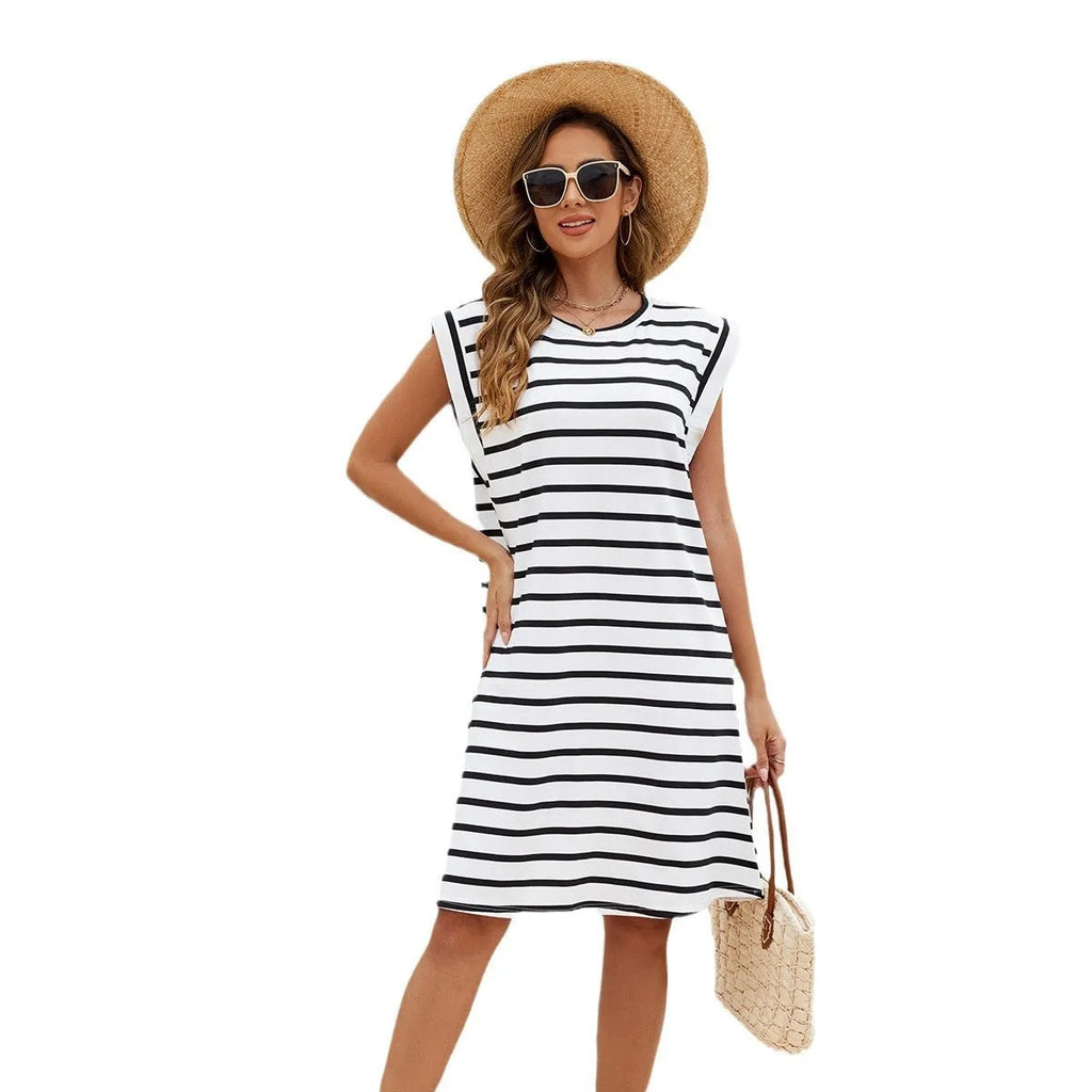 Black and white striped polyester beach cover-up blouse for women on mannequin