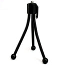 Compact black iron frame mini desktop tripod with a ball head, shown folded and extended next to a smartphone.