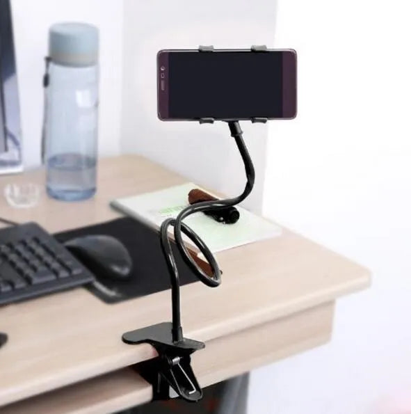 Black universal phone holder with long 70cm flexible arm and V-type clip, mounted on a bed frame.