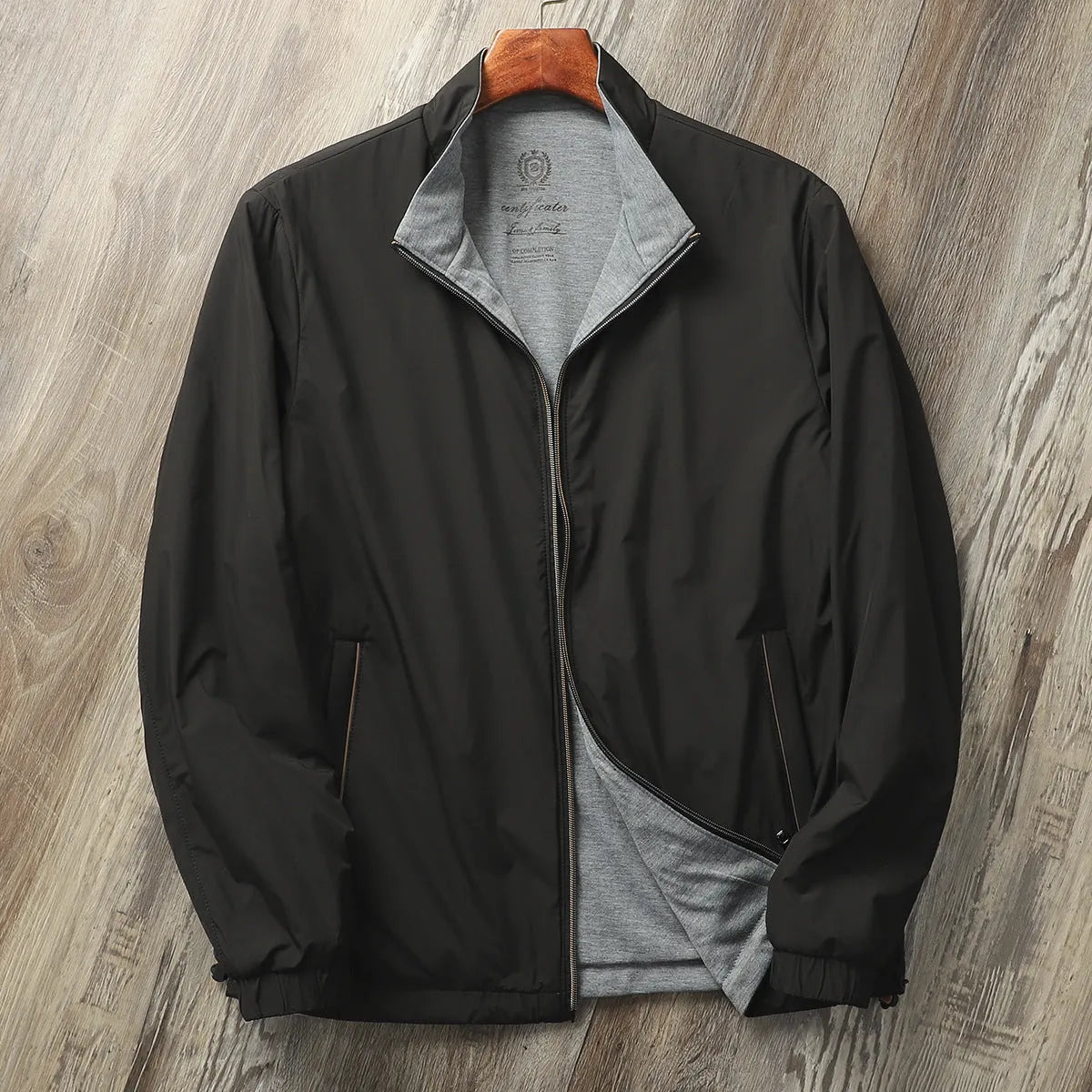 Men's stand collar casual jacket in army green with a simple design and regular sleeves.