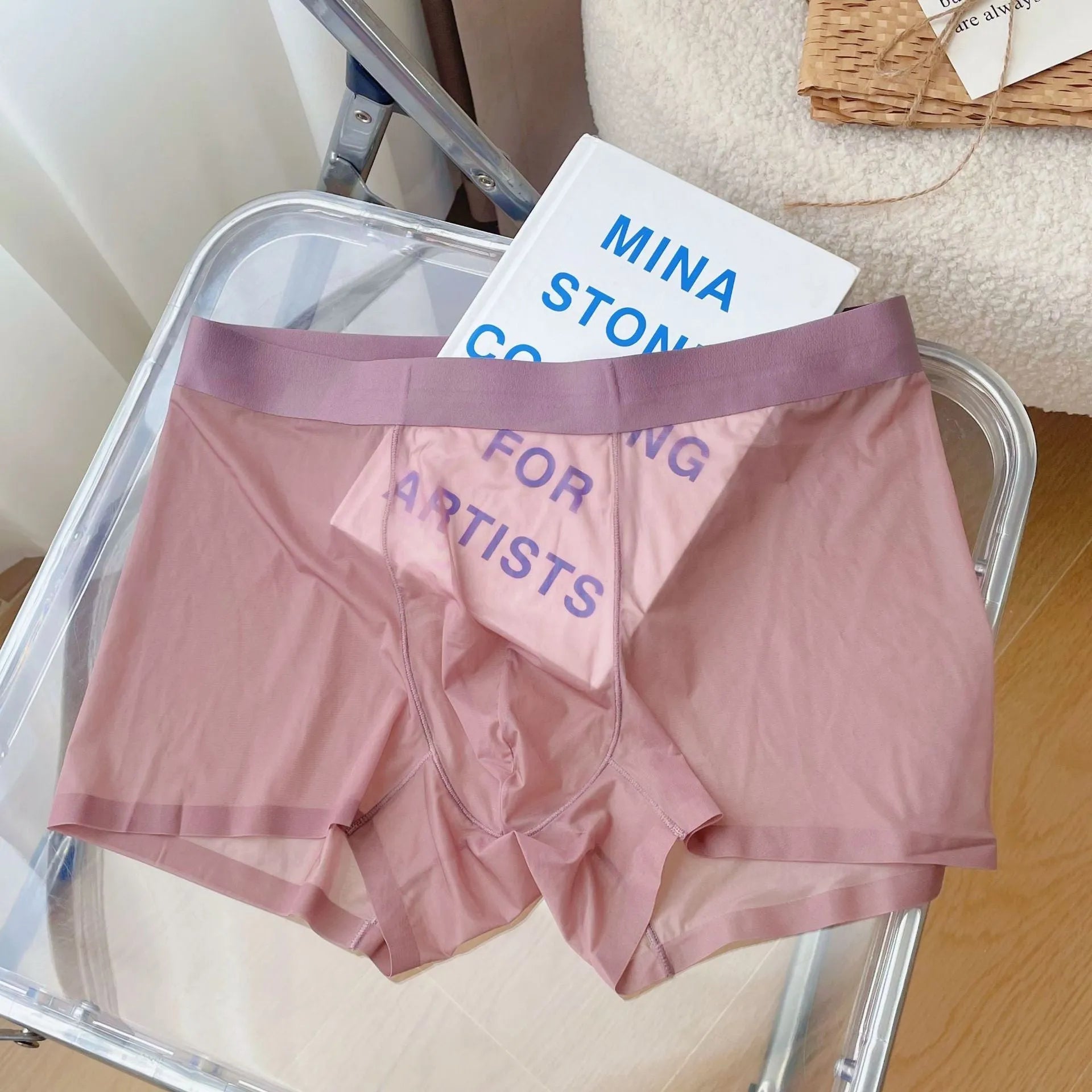 Men's thin seamless boxer shorts in knit nylon fabric, shown in light brown colour with quick-dry and breathable properties.