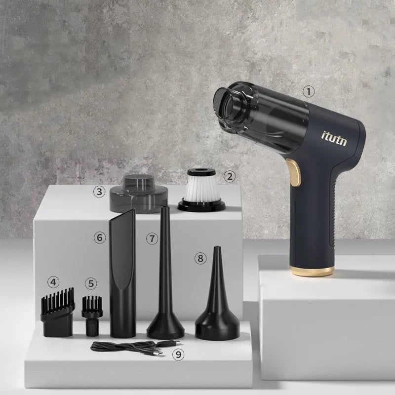Black wireless handheld car vacuum cleaner with multiple nozzle attachments on a white background.