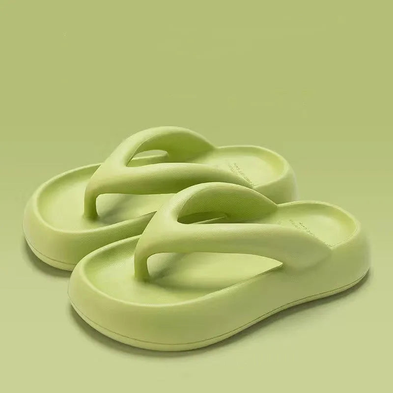 Solid colour EVA flip-flops with a thick sole and a decorative bow on the thong strap.