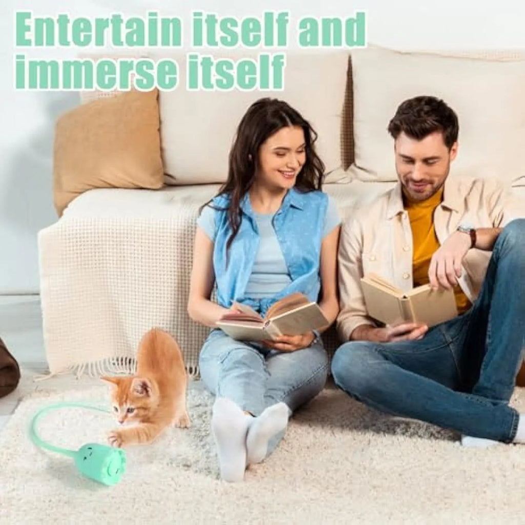 Green automatic electronic cat wand toy with swinging silicone tails on white background