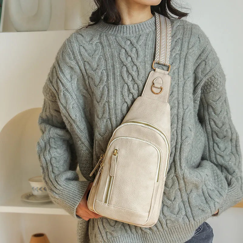 Women's small messenger chest bag in soft PU with crossbody strap and multiple compartments