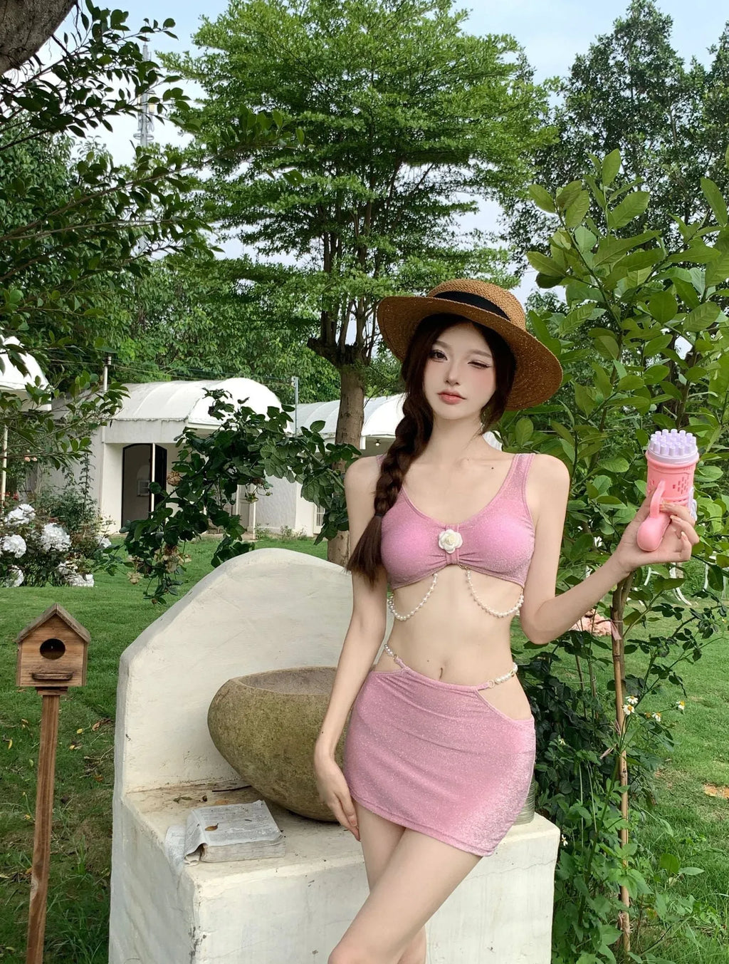 Bear Vacation brand three-piece bikini swimsuit for women in pink or black, showing briefs and sleeveless top.
