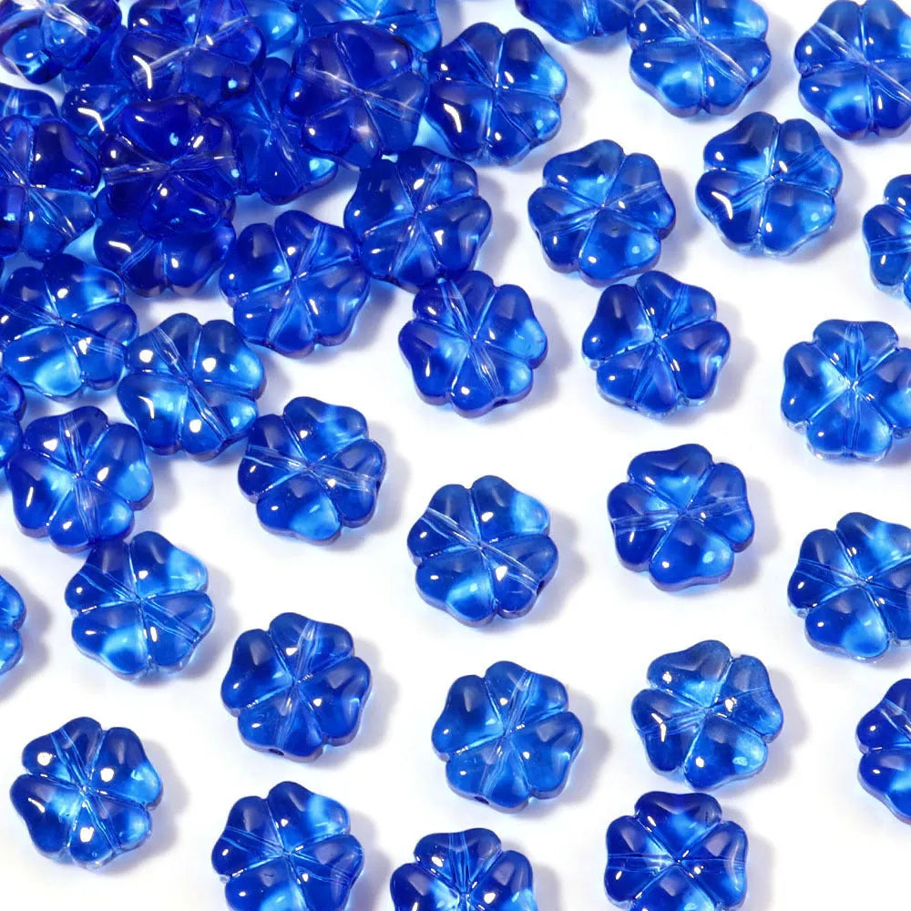 50 glass four-leaf clover beads in assorted colours with coloured glaze finish and 10mm straight hole design.