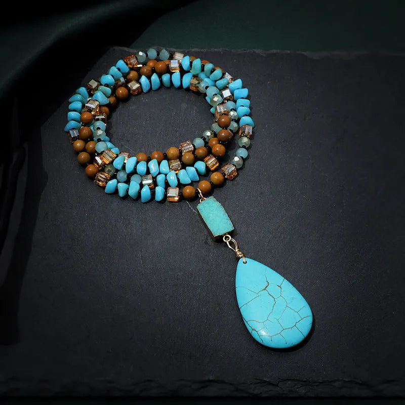 Blue turquoise pendant necklace with mixed gem inlay drop design on ball bead chain