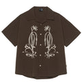 Brown striped Cuban collar short sleeve outdoor shirt laid flat.