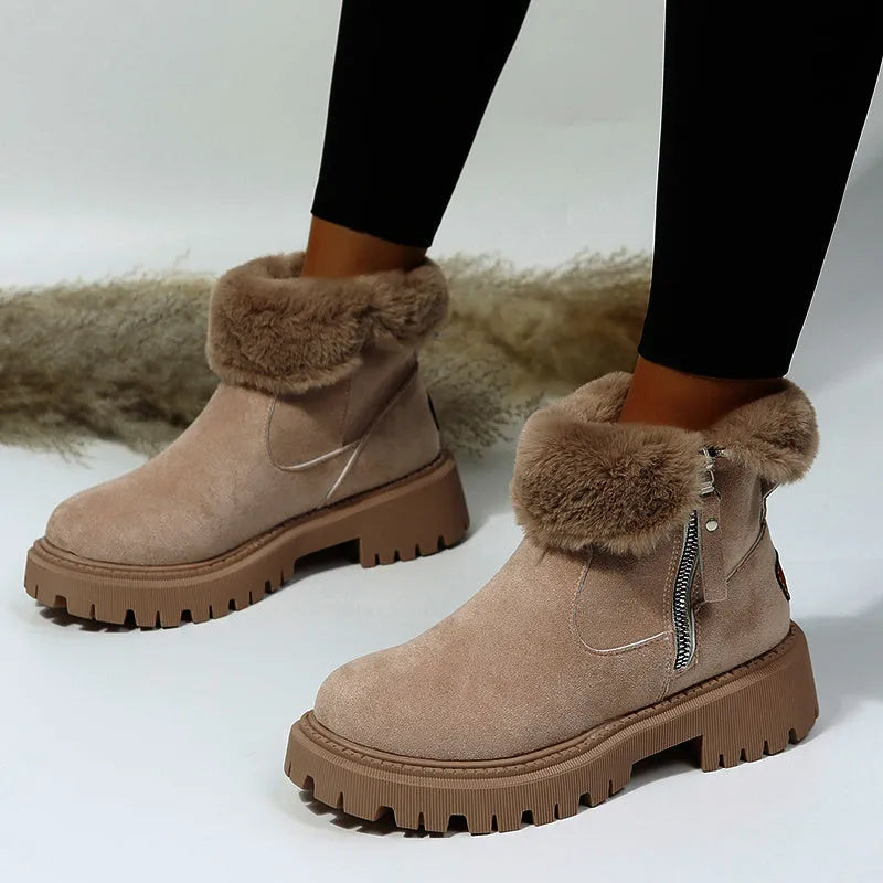 Women's black faux suede high-top snow boots with side zipper and thick plush lining.
