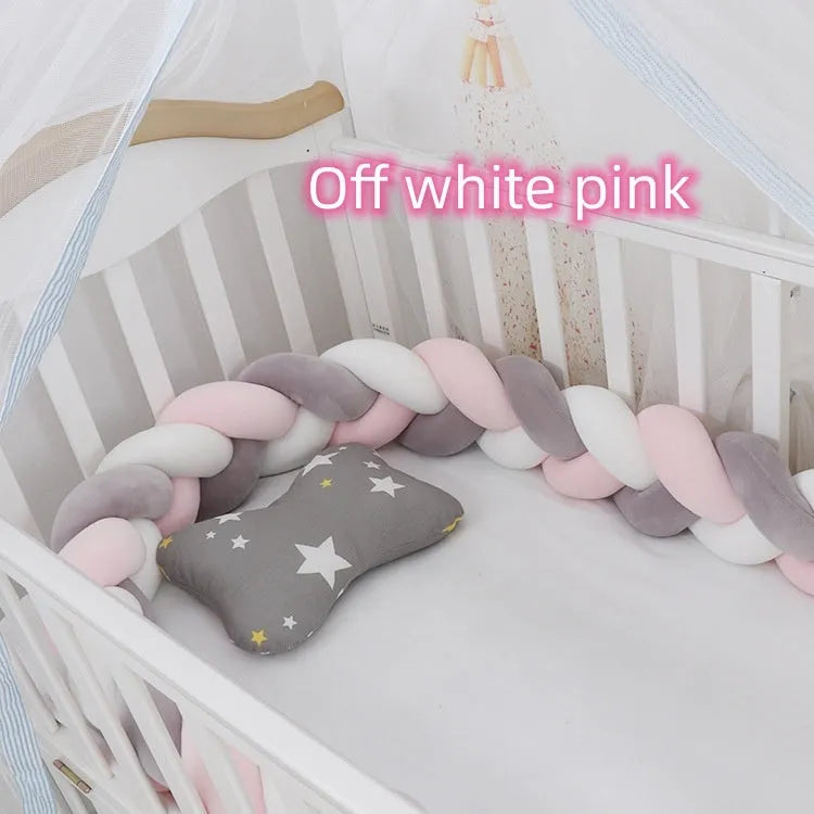 Multi-colour baby crib bumper made of spandex velvet, shown bent around a crib edge.