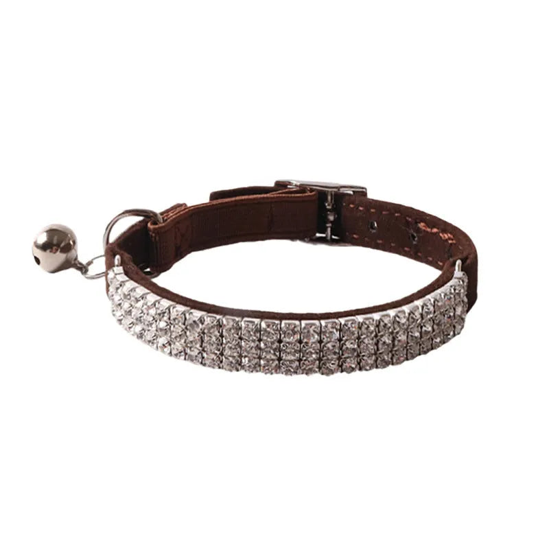 Soft flocking cat collar with an elastic buckle, shown in pink, black, red, blue, purple, and dark brown.