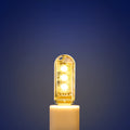 Small round USB baby night light showing warm and white light colour options