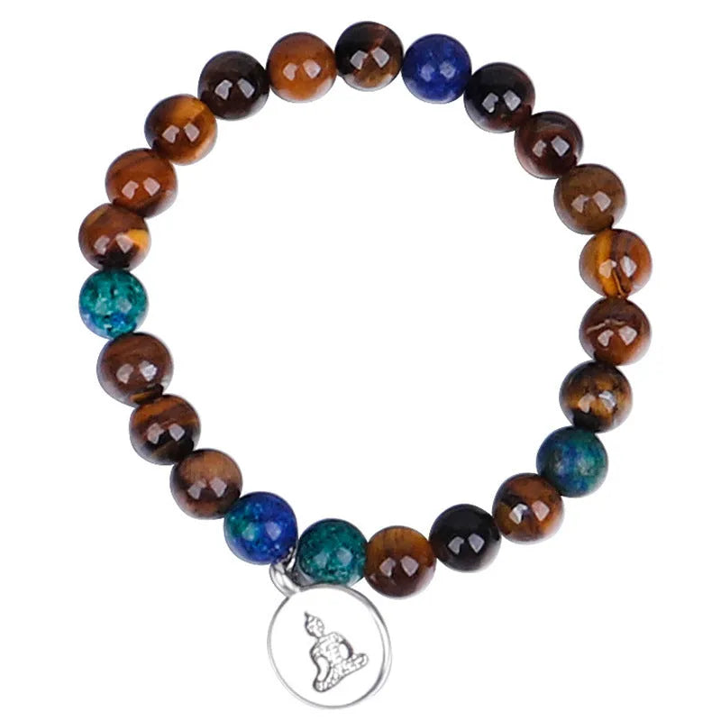 Handmade tiger eye stone bead necklace with tassel pendant and matching bracelet on a neutral background