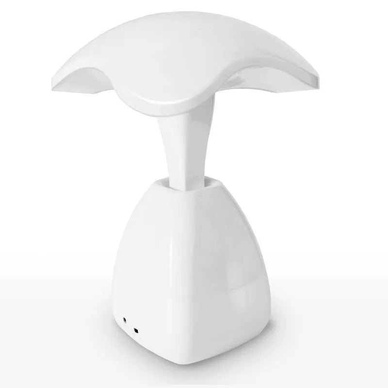 White modern LED desk lamp with a touch-sensitive base and plastic shade.