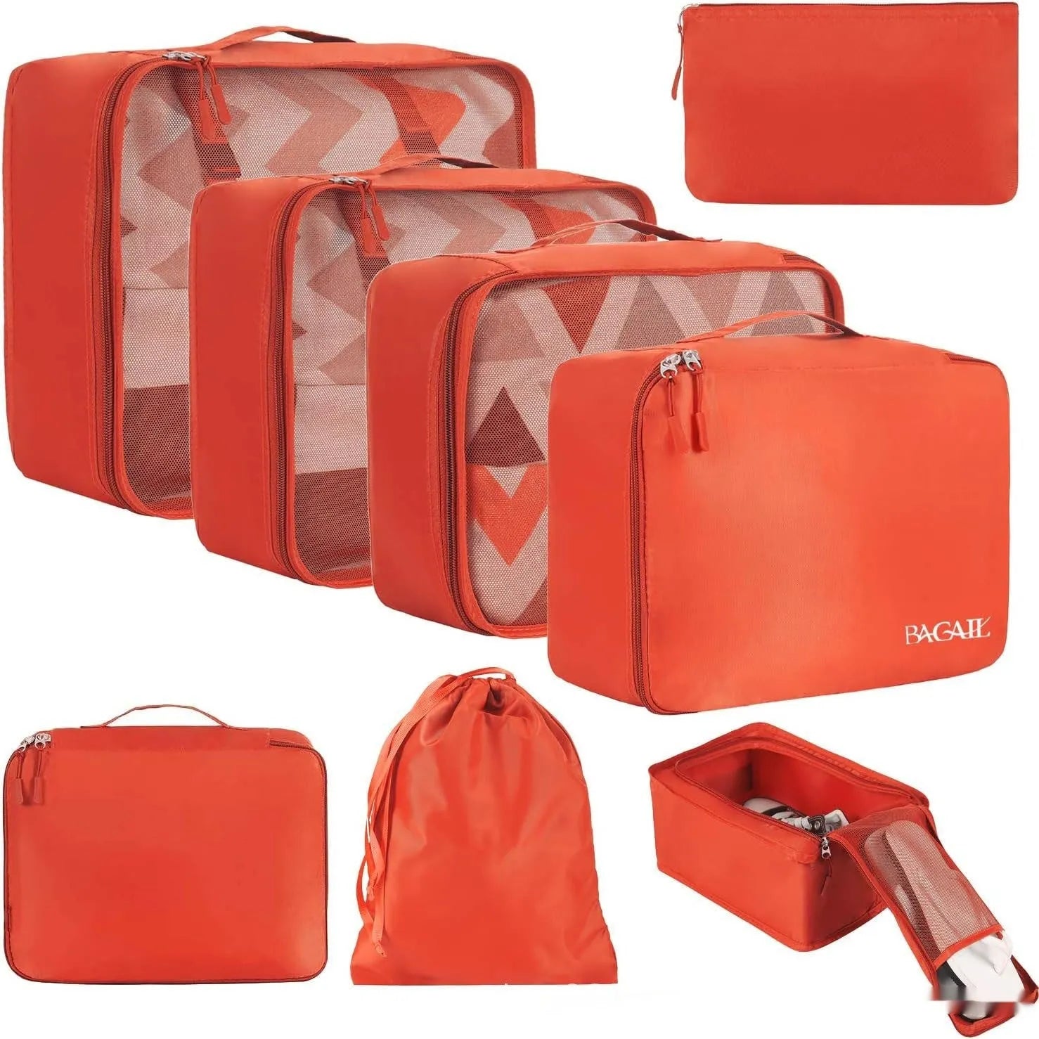 Eight cubic travel packing bags in various colours including beige, black, pink leopard print, and white pink stripes