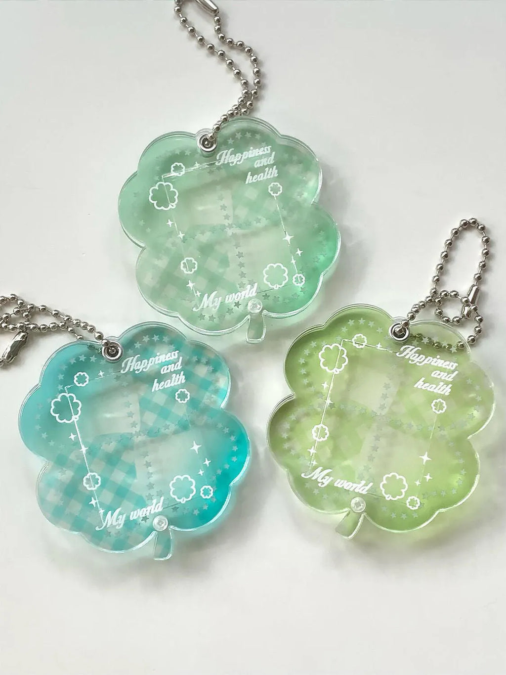 Acrylic four-leaf clover phone pendant keychain in blue and green colours
