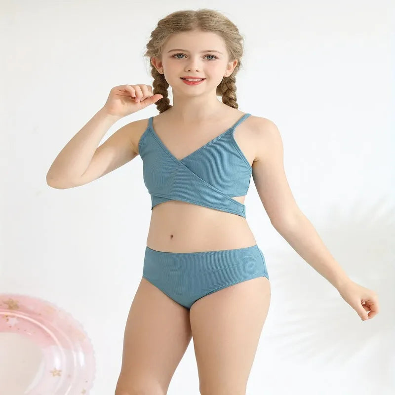Girls two-piece criss-cross swimsuit set in blue green with polypropylene fabric