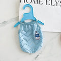 Light blue pet cooling vest with mesh straps on a mannequin, showing camisole-style cut.