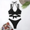 Women's solid colour strap bikini swimsuit in briefs style with multiple colour options