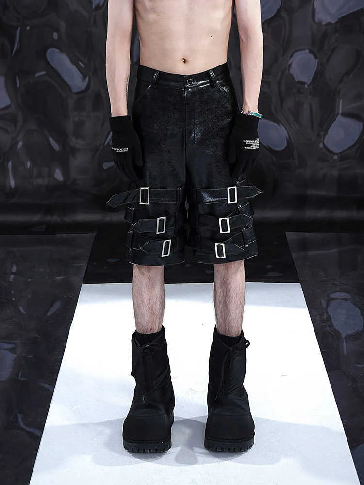Men's black casual shorts with leather ring detail on PU leather panels