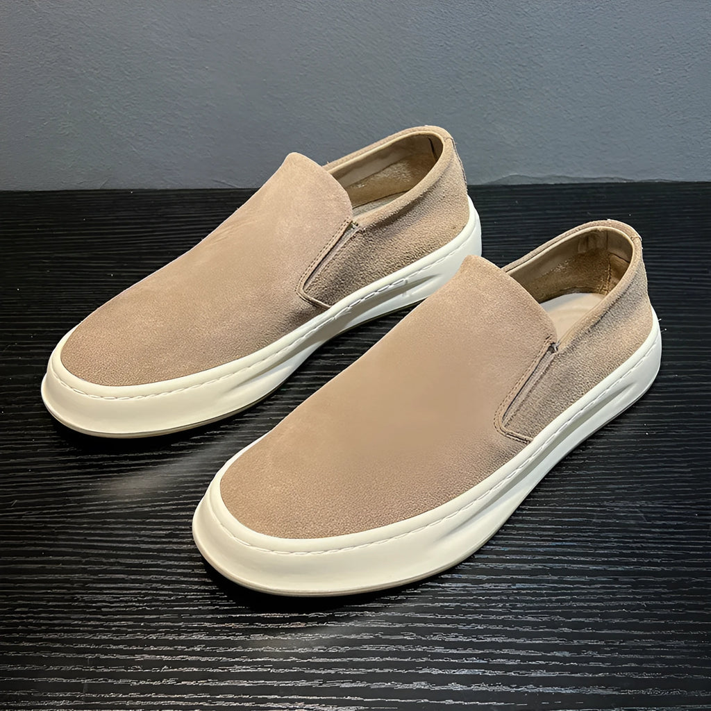 Men's grey casual shoes with round toe and sewing line detail on PU upper