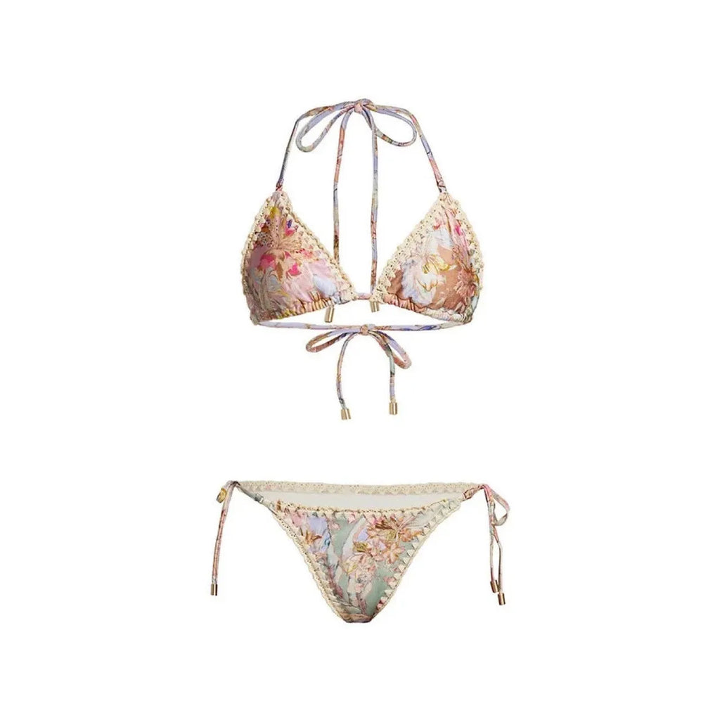 Women's floral bikini swimsuit set with skirt in creamy-white colour, showing top, briefs, and cover-up components