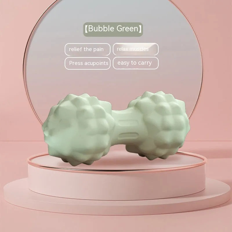 A 6cm diameter TPR foot massage ball shown in one of four colour options: pink, blue, green, or purple.