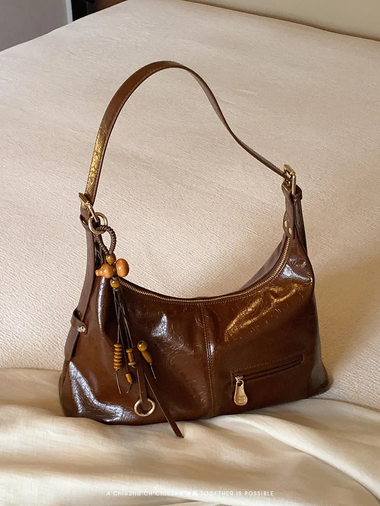 Large capacity women's PU shoulder tote bag in sugar brown, horizontal square shape, on a plain background