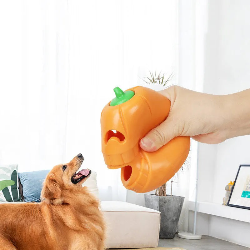 Orange pumpkin shaped interactive dog chew toy with treat dispensing funnel