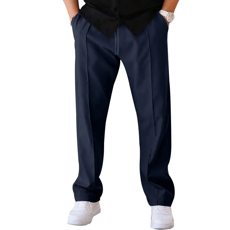 Men's loose straight drawstring trousers in waffle polyester fabric, shown in multiple colour options