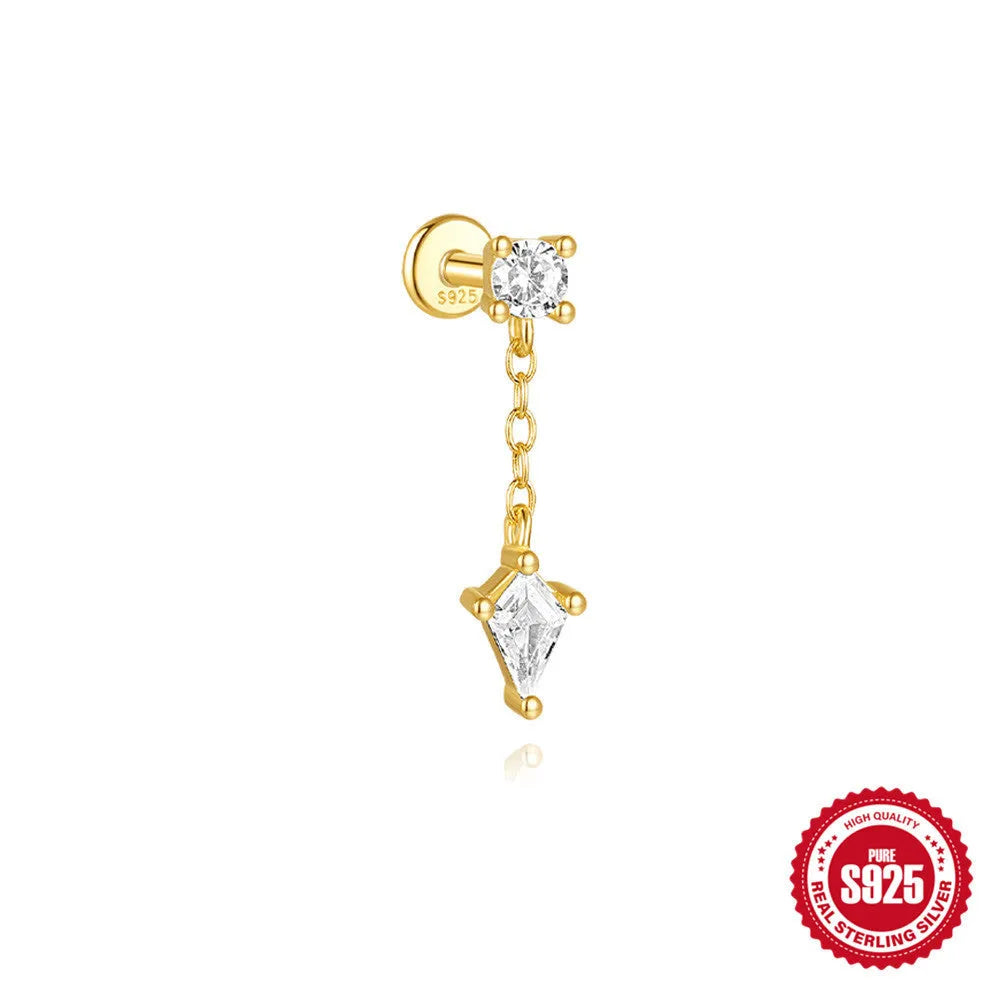Geometric kite-shaped sterling silver stud earrings with rhinestones and a gold chain tassel.