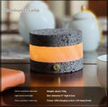 Compact orange volcanic rock USB night lamp with dimmer and essential oil tray.