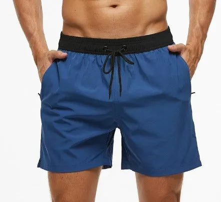 Men's blue athletic shorts with a stitching waistband, drawstring, and side headband pocket.