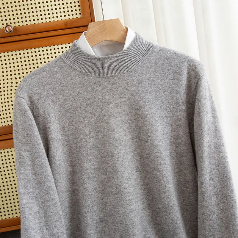 Man wearing a loose-fit half-collar wool sweater in a camel colour, suitable for winter casual wear.