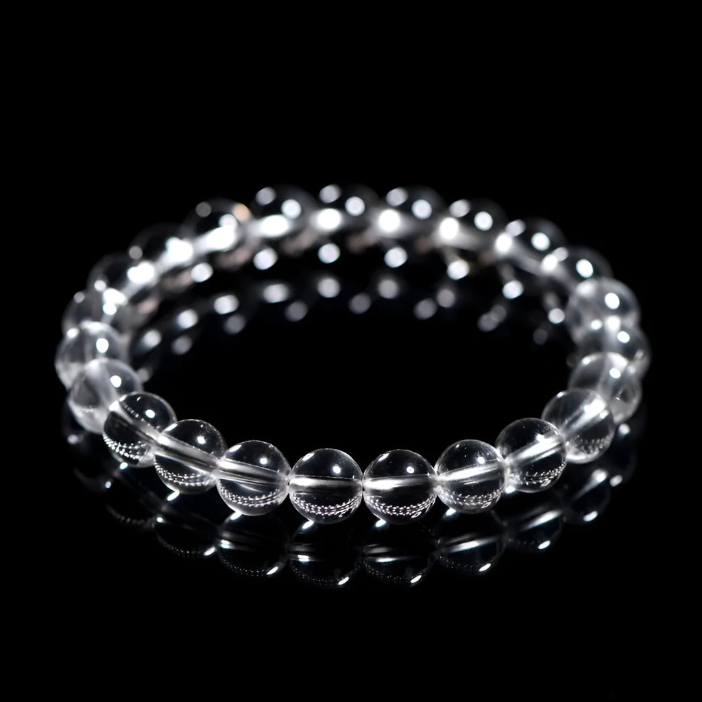 Natural Donghai old materials white water round bead crystal bracelet on a wrist, showing geometric design.