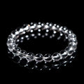 Natural Donghai old materials white water round bead crystal bracelet on a wrist, showing geometric design.
