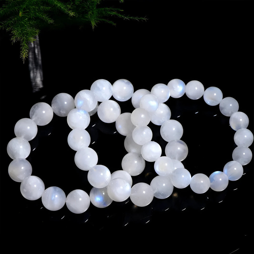 Natural moonstone round bead bracelet showing white blue moonlight colour