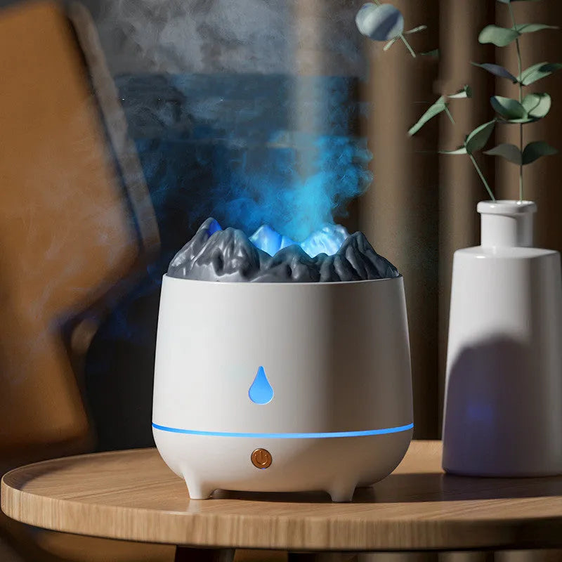 Volcano-shaped white humidifier with USB cable and mist rising from top