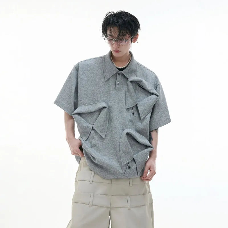 Men's deconstructed collar polo shirt with geometric pattern in polyester fabric, showing shirt collar detail and short sleeves