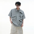Men's deconstructed collar polo shirt with geometric pattern in polyester fabric, showing shirt collar detail and short sleeves